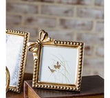 6 Antique Gold Bow Frame